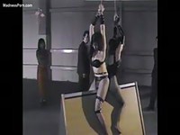 Asian amateur girl in dungeon bondage