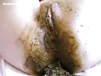 Tied up young slut pooping in a baby diaper for her dominating partner