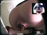 Adorable Asian girl shits in the toilet