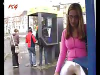 Innocent looking girl pissing in her white pants while in public