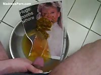 Angry daddy pees and shits on his daughter's portrait