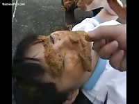 Tied up Asian teenage girl left in public to have her face used as a scat dump
