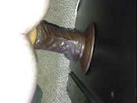 Fuck-hungry Russian student erotically rides on a big rubber dick