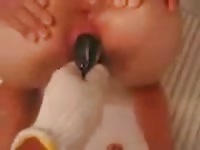 Insane animal insertion movie features a bent over Asian hoe being stuffed with live eels