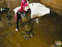 Catwoman Lyndra masturbates in cowshit